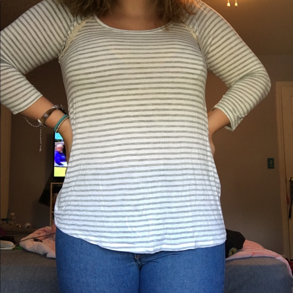 Gray and white striped three quarter shirt